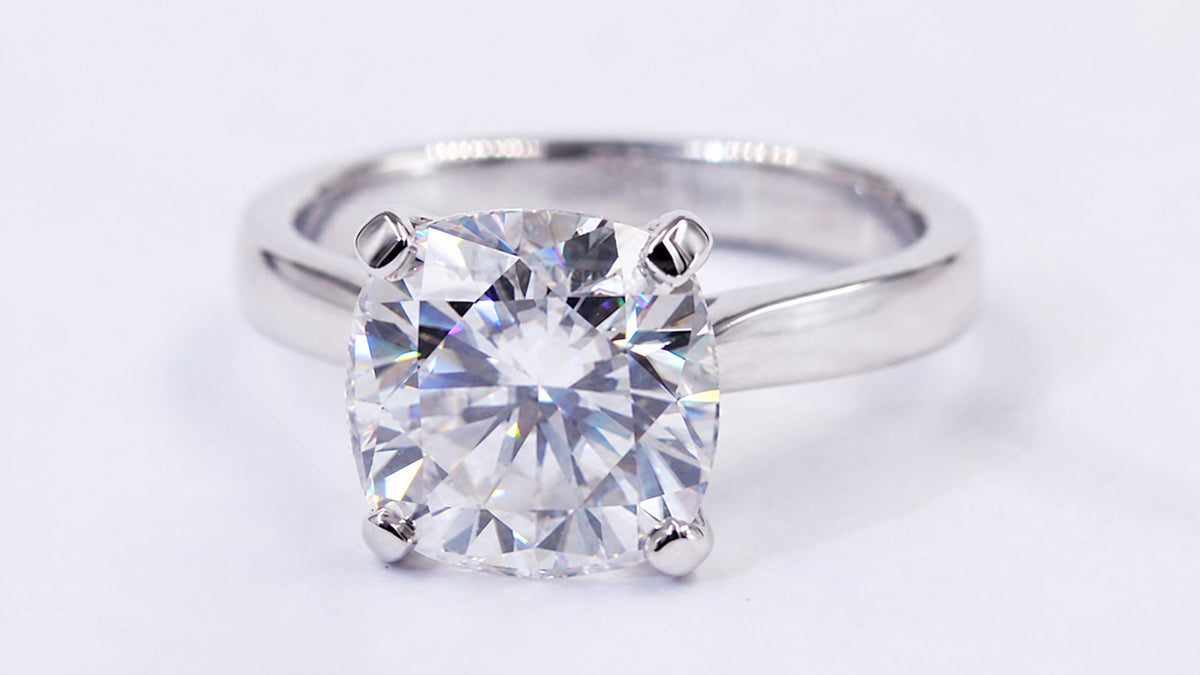 Angled detail of the cushion moissanite setting