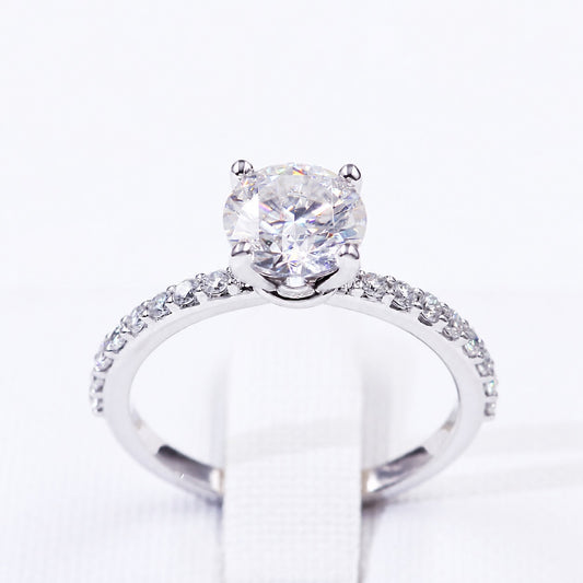 Moissanite centre and stone-set shoulders