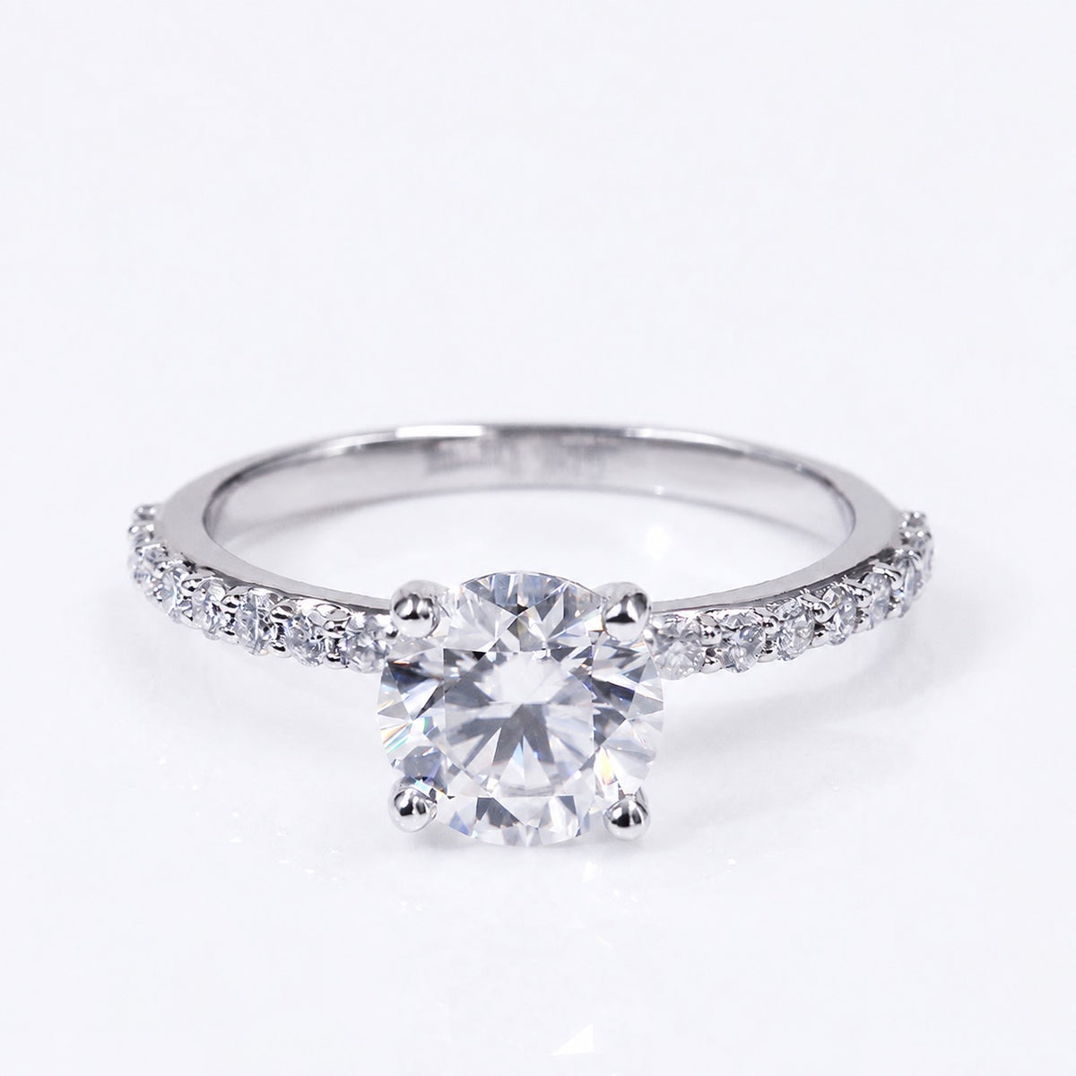 Round moissanite ring with stone-set band