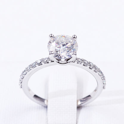 Moissanite centre and stone-set shoulders