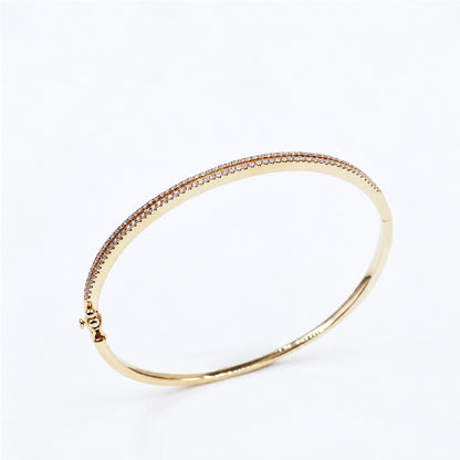 Angled view of the slender pavé bangle