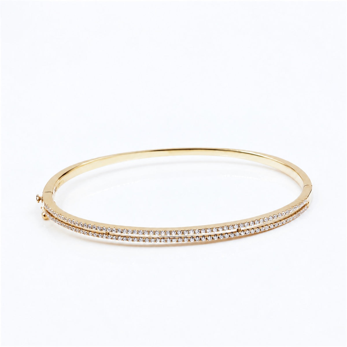 Side profile of the golden pavé bangle