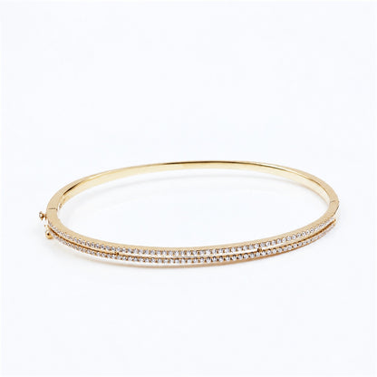 Side profile of the golden pavé bangle