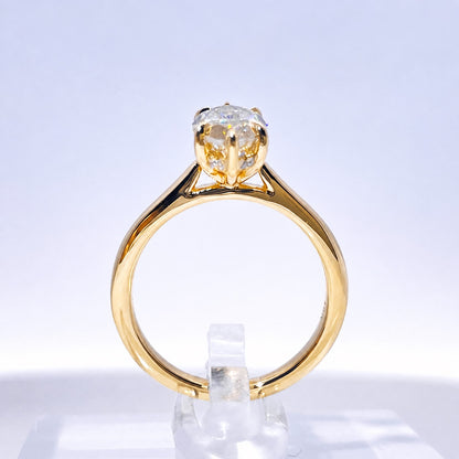 Champagne marquise ring showing the raised setting