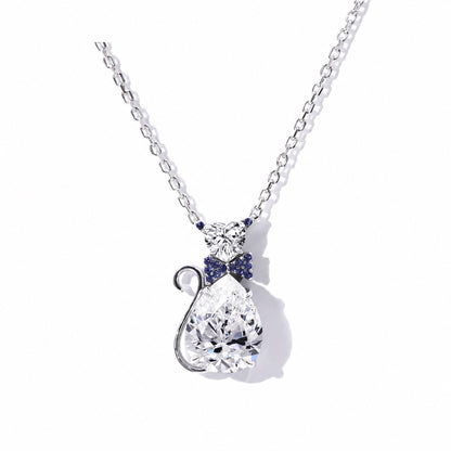White gold moissanite cat pendant with a curled tail