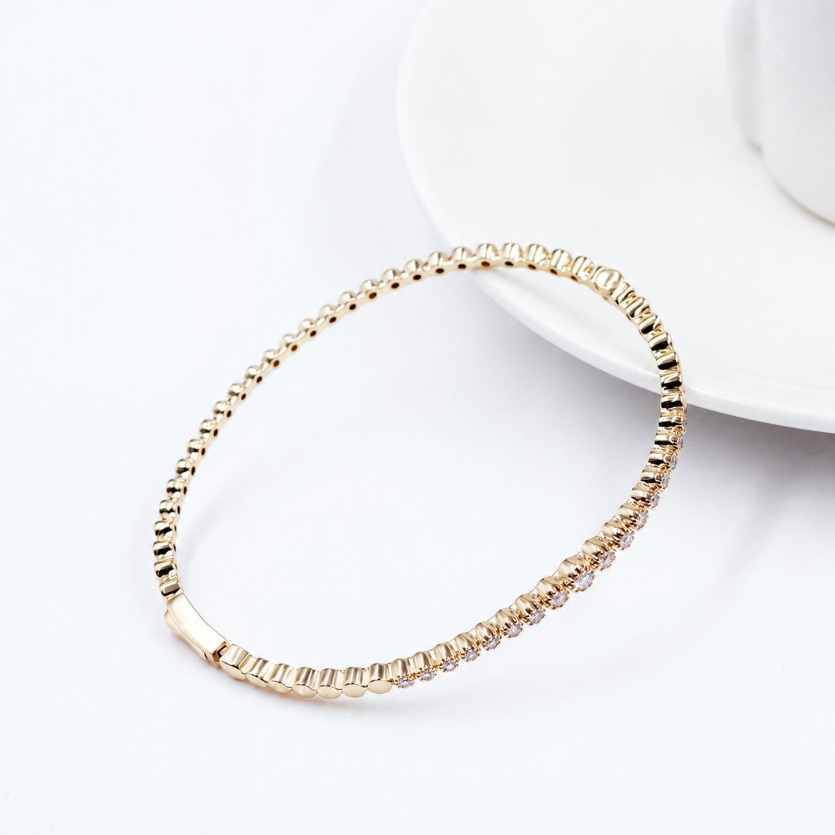 Moissanite bezel bracelet displayed in an oval shape