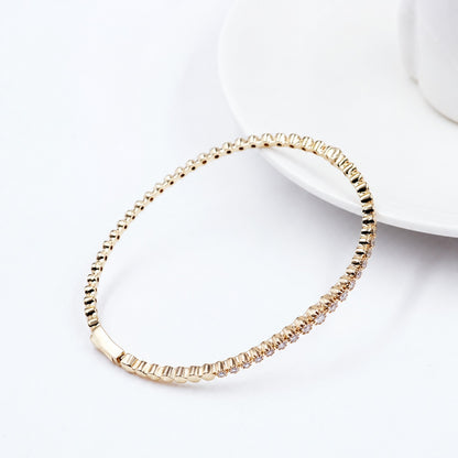 Moissanite bezel bracelet displayed in an oval shape