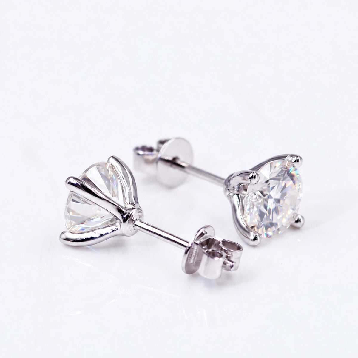 Moissanite studs with open baskets and post fittings