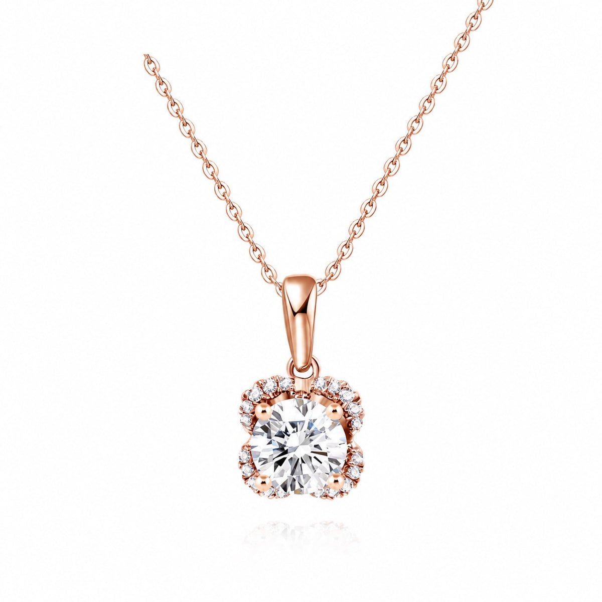 Round moissanite pendant in a sculpted rose gold basket