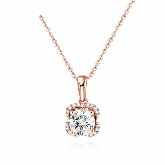 Round moissanite pendant in a sculpted rose gold basket