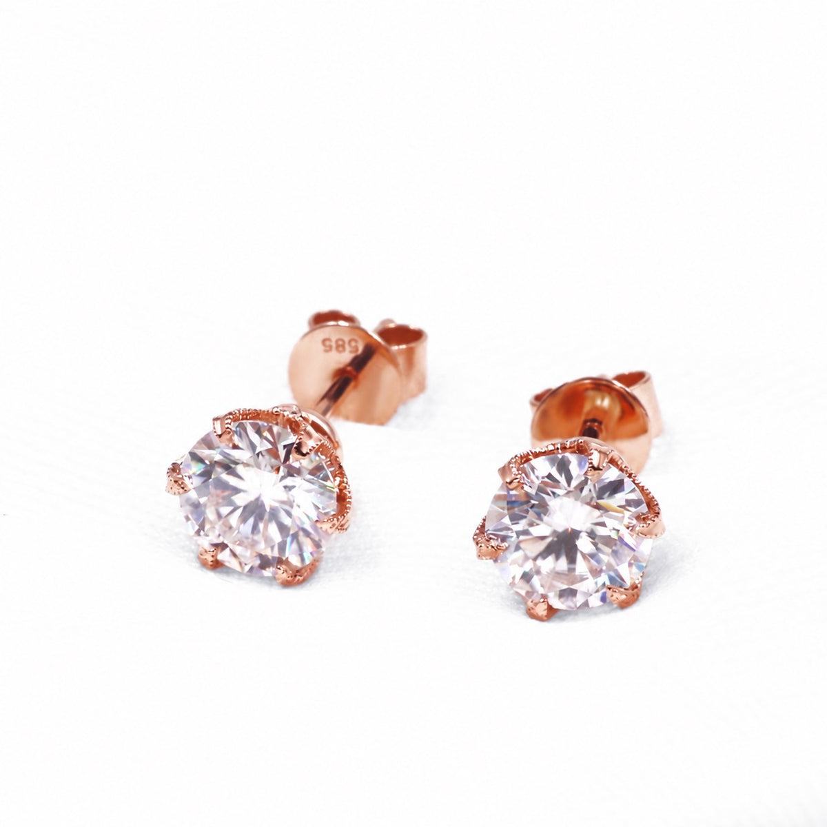 Rose gold moissanite earrings showing their backs