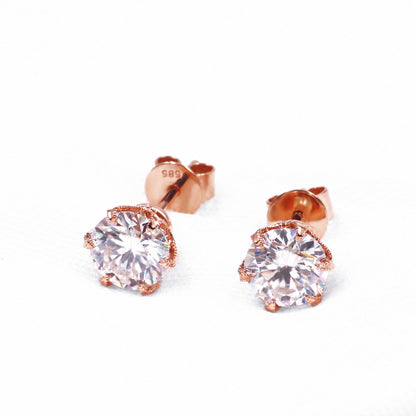 Rose gold moissanite earrings showing their backs