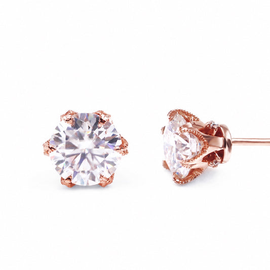 Rose gold moissanite stud earrings, front and side views