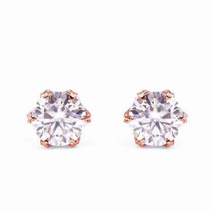 Round moissanite rose gold studs, front view