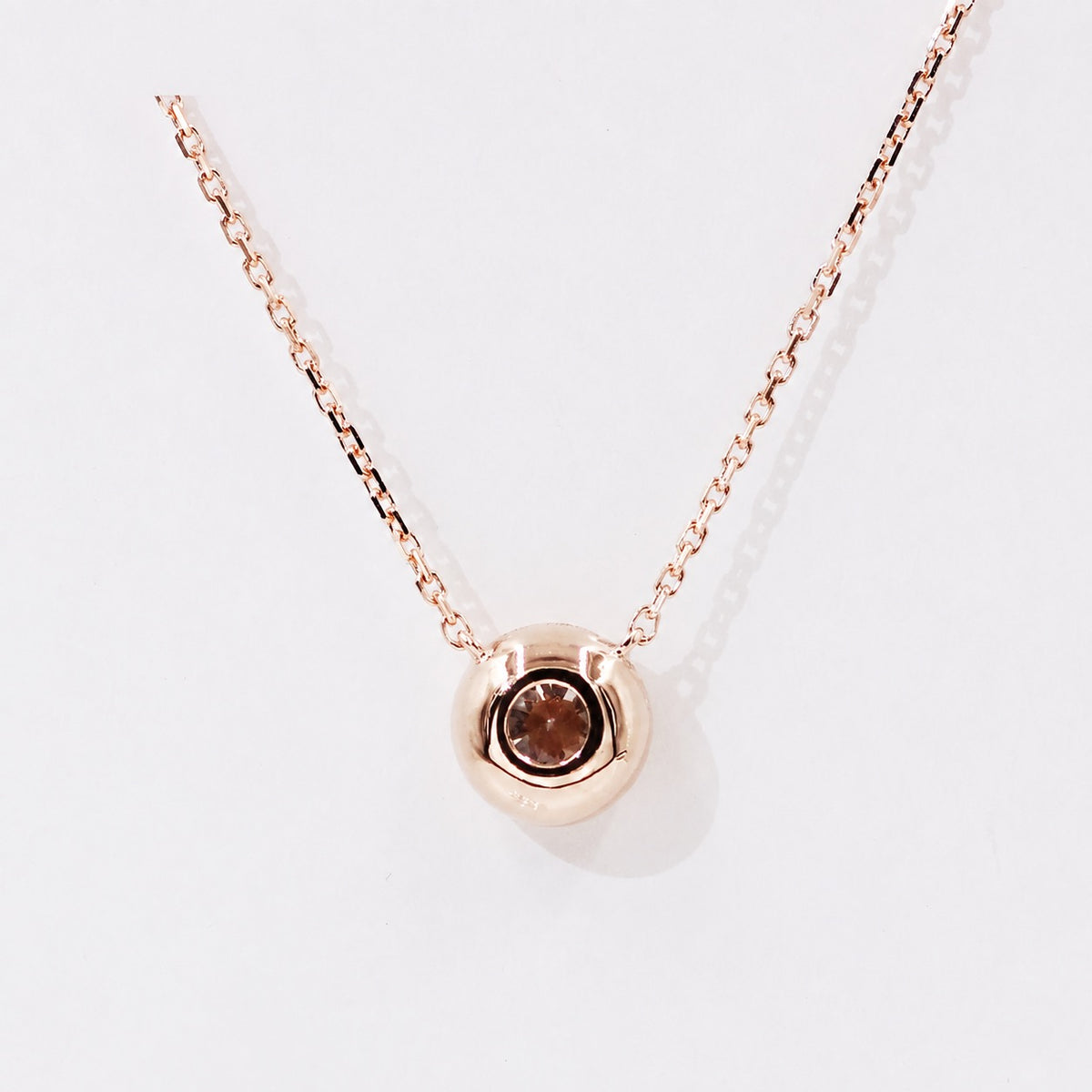 Open reverse of the rose gold bezel setting