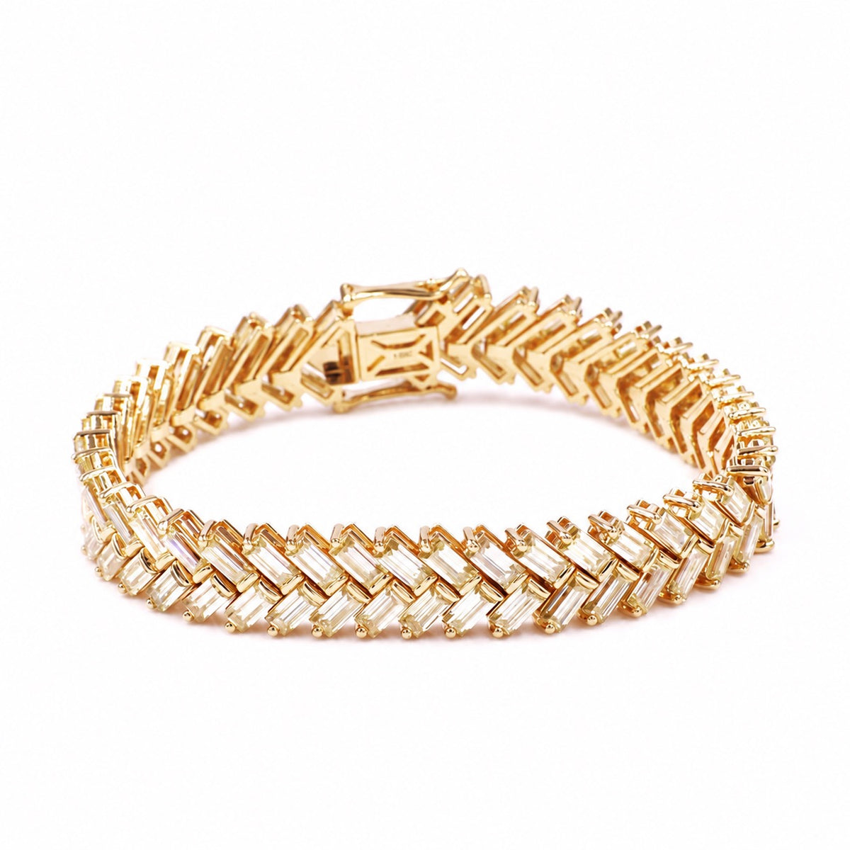Emerald-cut moissanite chevron bracelet in yellow gold