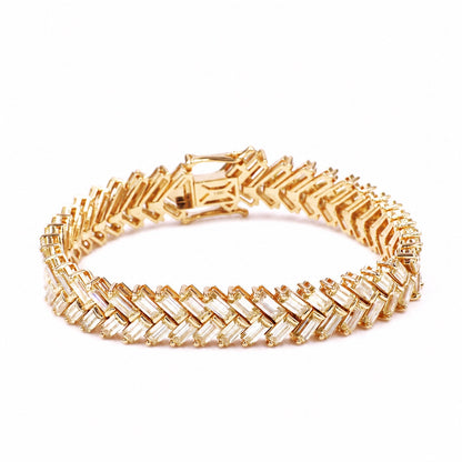 Emerald-cut moissanite chevron bracelet in yellow gold