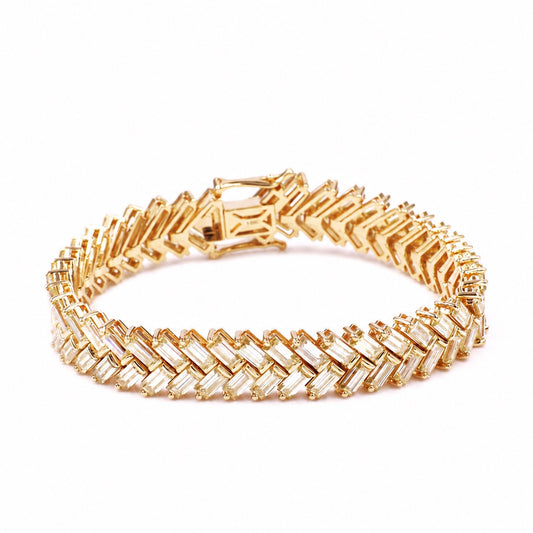 Emerald-cut moissanite chevron bracelet in yellow gold