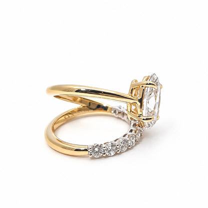 Side view of the sculptural two-tone ring setting