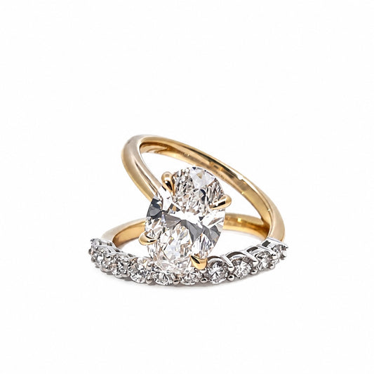 Oval lab-grown diamond ring with a two-tone double band