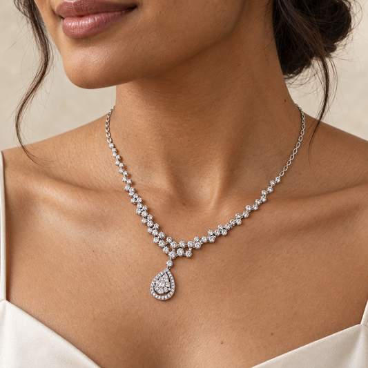 AI-styled view of the Moissanite Teardrop Garland Necklace worn at an open neckline.