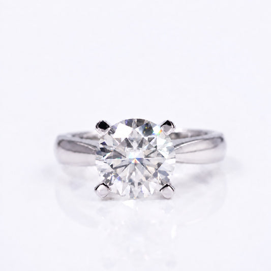Cushion moissanite solitaire ring with four prongs