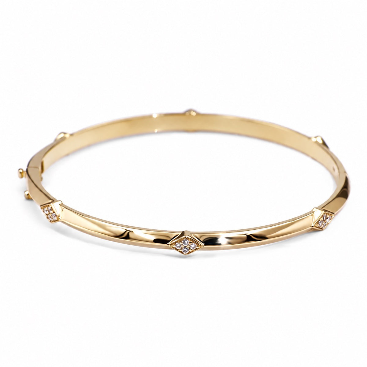14k yellow gold bangle with diamond-set lozenge motifs
